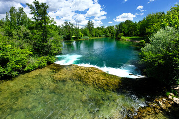 Beautiful green Mreznica river in Belavici village in Croatia, natural landscape