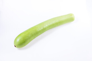 A gourd on a white background, Chinese summer vegetables