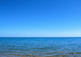Fototapeta premium blue ocean and sea with white sand and blue sky with cloud background.