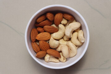 Cashews, almonds, Nuts in bowl with a copy space.