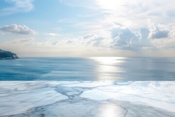 Obraz premium White marble table with sky and sea background for product display.