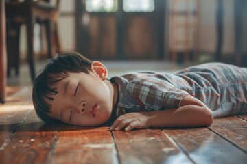 A boy lying down, eyes closed, possibly taking a nap or relaxing - Powered by Adobe