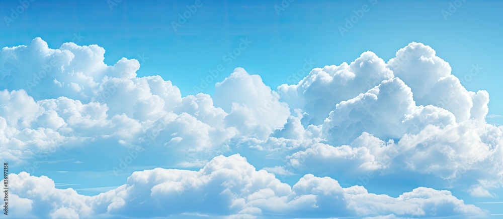 Poster The stunning array of clouds against a blue sky with copy space image.