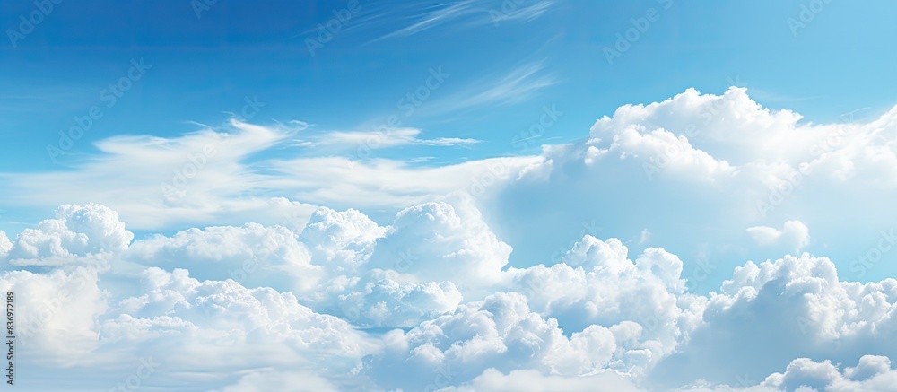 Aufkleber abstract style panorama with a backdrop of blue sky, white clouds, and copy space image.
