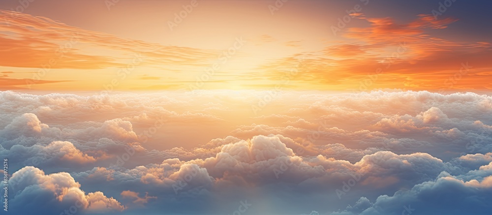Poster sunset sky viewed from an airplane with white clouds, perfect for a copy space image.