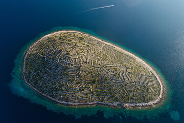 Aerial view of Bavljenac island also known as Fingerprint Island, Croatia