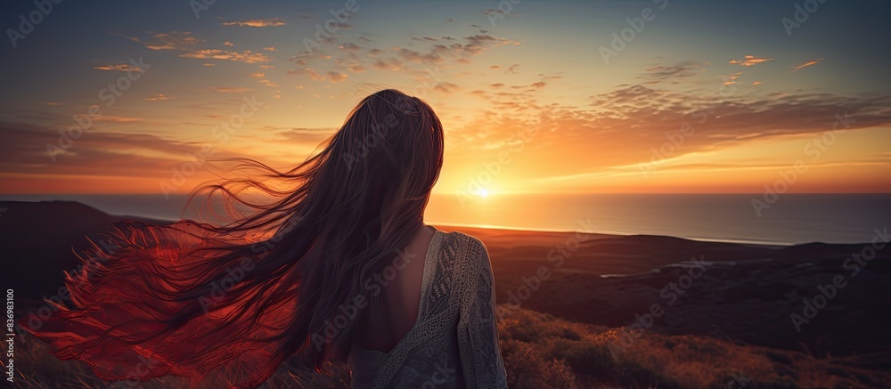 Aufkleber woman enjoying a beautiful sunset with a mesmerizing view, captured in a serene moment with copy spa