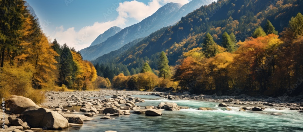 Poster autumn at a river flowing through a high mountain, with a scenic backdrop perfect for a copy space i