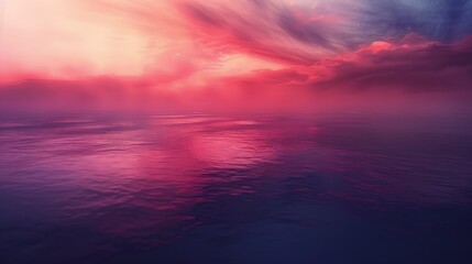 Obraz premium Serene Ocean Sunset with Vibrant Pink and Purple Clouds Reflecting on Water Surface