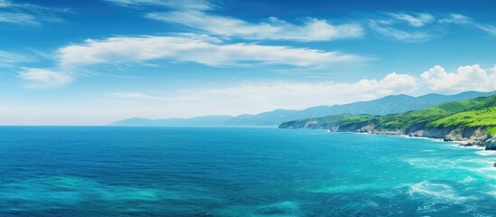 Obraz premium natural wonder when the tones of green and the blue of the sea come together. Creative banner. Copyspace image