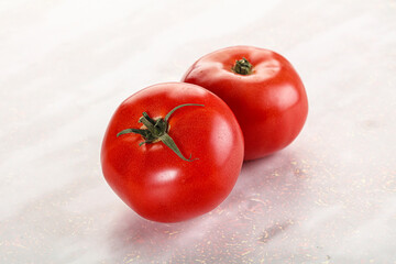 Two ripe sweet organic tomato