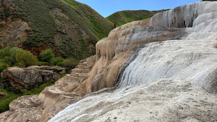 Travertines of Başkale, in Van province of Turkey, a small travertine with small amount of underground mineralized water, coloring the travertines