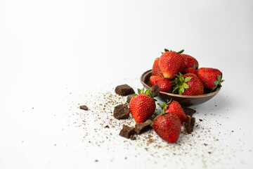 fresh, natural strawberries. delicious dessert with black chocolate. White background