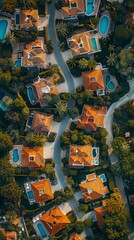 Obraz premium Luxury homes in high-altitude city district with vibrant tiger orange, corn yellow, sand, and cyan blue gardens.