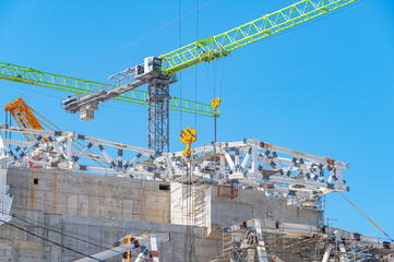 building under construction against evening sky