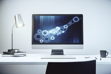 Fototapeta premium Modern computer monitor with robotics technology hologram. Research and development software concept. 3D Rendering