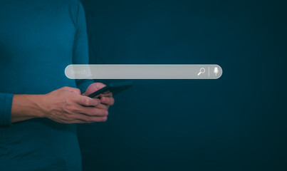 Information search technology, search engine optimization, male hand using a smartphone to search information, using the search bar function on your website