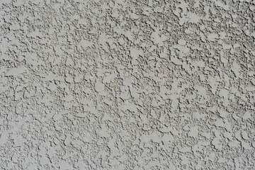 Textured wall surface with detailed rough pattern in neutral tone