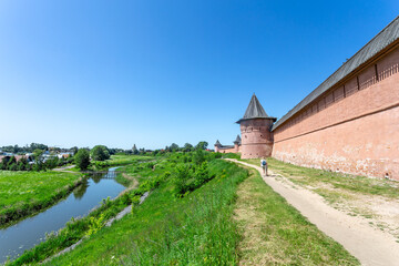 Fototapeta premium Suzdal, Russia, Golden Ring: Spaso-Evfimiev Monastery in summer against the background of the Kamenka River