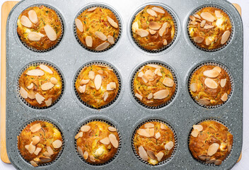 Beautiful and fresh homemade zucchini muffins. Food photography on white background.