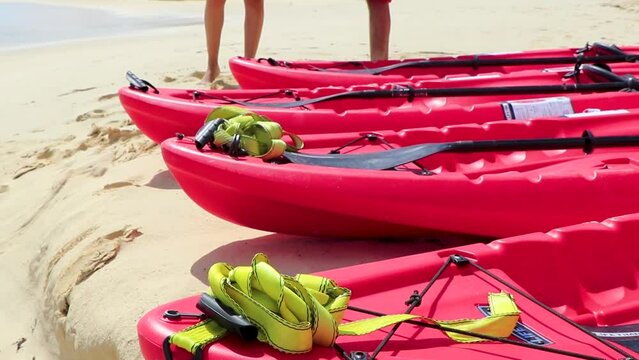 Red canoes at tropical beach panorama Playa del Carmen Mexico.