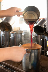Making coffee and tea with a traditional coffee maker.
