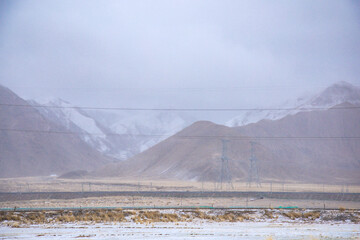 Haixi Mongolian and Tibetan Autonomous Prefecture, Qinghai Province - Meadow Road under Snowy Mountains