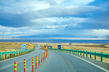 Haixi Mongolian and Tibetan Autonomous Prefecture, Qinghai Province - Meadow Road under Snowy Mountains