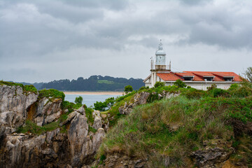 Fototapeta na wymiar Faro de La Cerda lighthouse. Magdalena Peninsula, Santander, Cantabria, Spain.