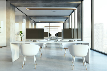 Clean spacious coworking office interior with window and city view, equipment, furniture, various other objects and daylight. 3D Rendering.