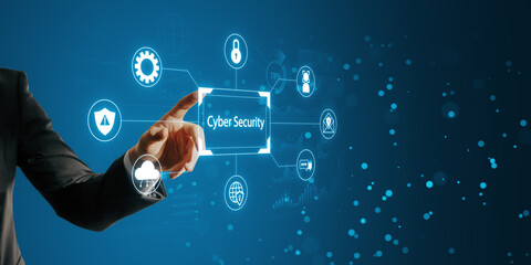 Close up of man hand pointing at creative digital hologram on blue background. Cyber security and...