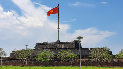 The Flag Tower In Hue Imperial Citadel. Hue Imperial Citadel, A UNESCO Cultural Heritage Is A Major Tourist Destination In Vietnam.