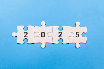 2025 on Jigsaw Puzzle with Blue Background