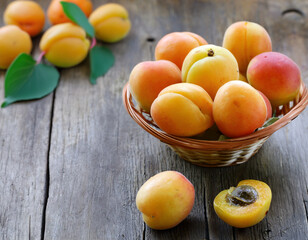 fresh organic apricots on wooden table