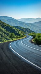 Fototapeta premium Winding Road Through Mountain Pass on a Sunny Day