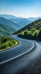 Fototapeta premium Winding Road Through Mountain Pass on a Sunny Day