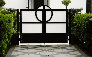 geometric pattern gate design with wrought iron and frosted glass