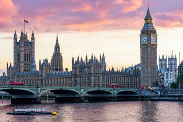 Fototapeta premium Houses of Parliament with Big Ben tower and Westminster bridge at sunset, London, UK