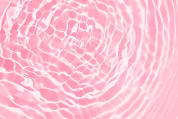Abstract clear pink water wave texture or natural ripple background. Shadow of water on sunlight. Mockup for product, skin care cosmetics advertisement. Trendy abstract summer background. Copy space