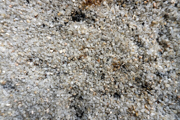 White sand and small pebbles for background