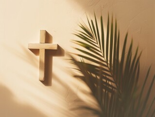 A wooden cross is on a wall with a palm tree in the background. The cross is the main focus of the image, and the palm tree provides a natural and calming background