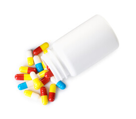 Antibiotic pills and bottle isolated on white, top view