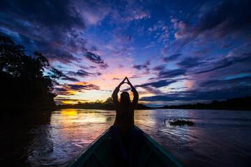 A sunset over the Amazonian jungle is a breathtaking spectacle of nature, offering a mesmerizing...