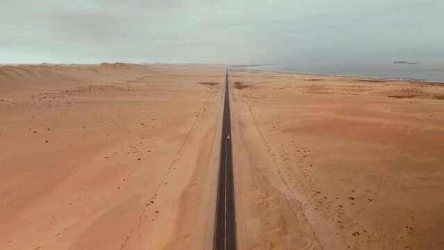 Straight, long road in the desert.
