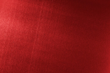 Beautiful red foil as background, top view