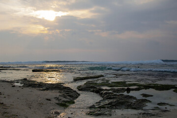 low tide beach with coral beach, horizontal view of sunset beach