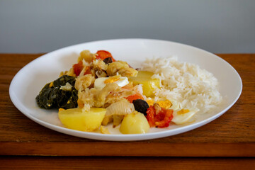 Traditional Portuguese bacalhoada with classic ingredients. When cod Oven