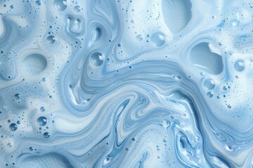 Abstract blue fluid art with swirling patterns and water droplets