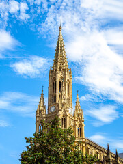 Fototapeta premium The bell tower of the Buen Pastor Cathedral (The Good Shepherd cathedral) of San Sebastian. Gipuzkoa, Basque Country, Spain.