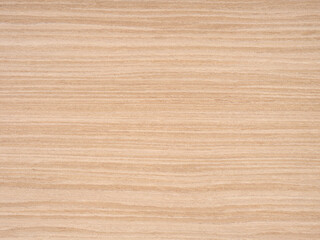 Subtle shades of beige and tan flow across the smooth expanse of this fine oak veneer